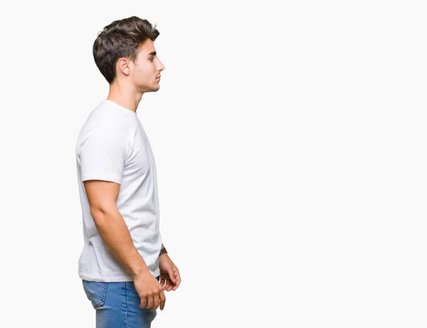 Jovem Homem Bonito Vestindo Shirt Branca Sobre Fundo Isolado Olhando — Fotografia de Stock