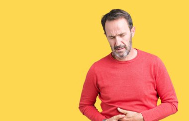 Yakışıklı orta yaş ağarmış komuta sizde üzerinde kış kazak giyen izole mide üzerinde el ile arka plan çünkü hazımsızlık, ağrılı hastalık hasta hissediyor. Ağrısı kavramı.