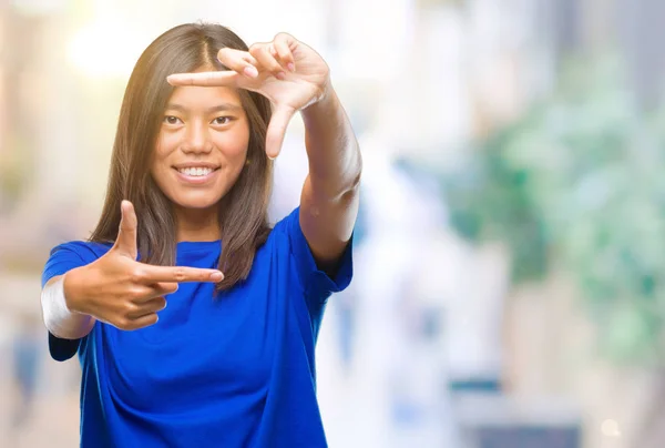 Young Asian Woman Isolated Background Smiling Making Frame Hands Fingers — Stock Photo, Image