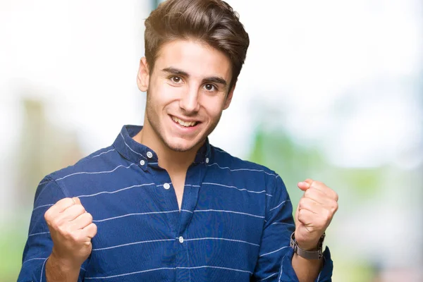 Jovem Homem Bonito Vestindo Camisa Marinha Sobre Fundo Isolado Comemorando — Fotografia de Stock