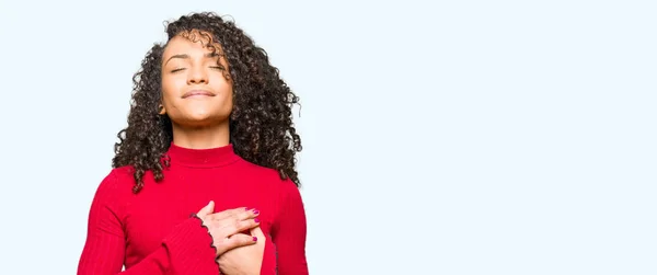 Young Beautiful Woman Curly Hair Smiling Hands Chest Closed Eyes — Stock Photo, Image