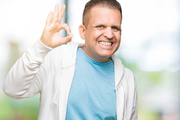 Hombre Árabe Mediana Edad Vistiendo Sudadera Sobre Fondo Aislado Sonriendo —  Fotos de Stock