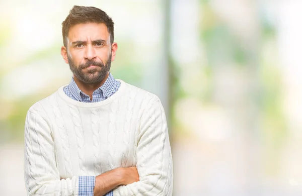 Hombre Hispano Adulto Usando Suéter Invierno Sobre Fondo Aislado Escéptico —  Fotos de Stock