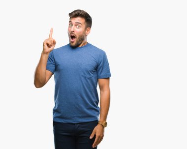 Yakışıklı delikanlı ile başarılı fikir parmağı yukarıyı izole arka plan üzerinde. Çıktıktan ve mutlu. Bir numara.