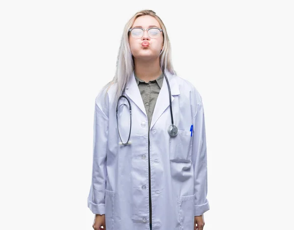 Young Blonde Doctor Woman Isolated Background Puffing Cheeks Funny Face — Stock Photo, Image