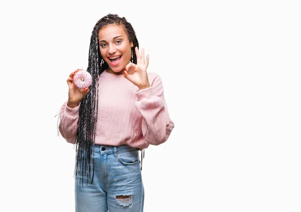 Young African American Girl Eating Pink Donut Isolated Background Doing — 图库照片