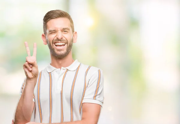 Joven Hombre Guapo Sobre Fondo Aislado Sonriendo Con Cara Feliz — Foto de Stock