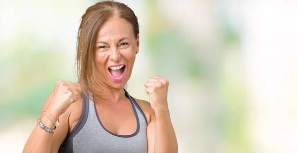 Hermosa Mujer Mediana Edad Vistiendo Ropa Deportiva Sobre Fondo Aislado —  Fotos de Stock