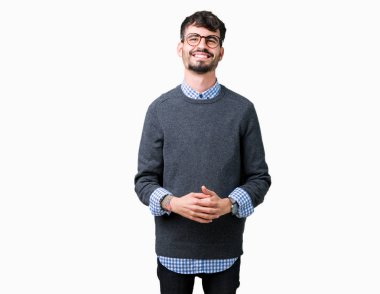 Genç yakışıklı zeki adam gözlüklü üzerinde arka plan eller birlikte izole ve rahat ve neşeli gülümseyen parmak çarpı işareti. Başarı ve iyimser