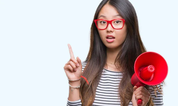 Young Asian Woman Holding Megaphone Isolated Background Surprised Idea Question — Stock Photo, Image