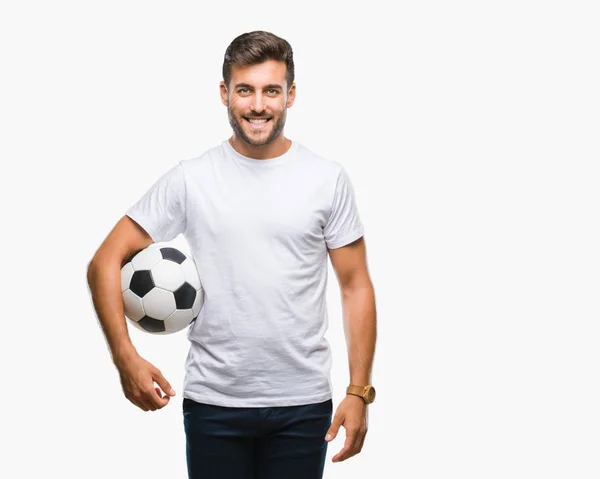 Jovem Homem Bonito Segurando Bola Futebol Sobre Fundo Isolado Com — Fotografia de Stock