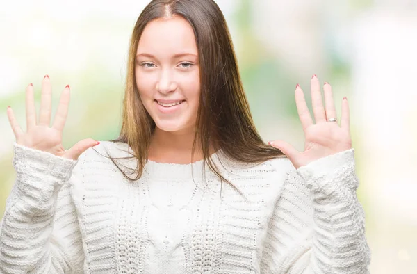 Unga Vackra Kaukasiska Kvinna Bär Vinter Tröja Över Isolerade Bakgrund — Stockfoto