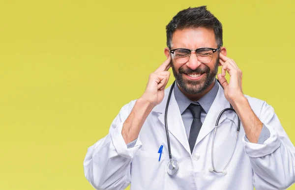 Adult Hispanic Doctor Man Isolated Background Covering Ears Fingers Annoyed — Stock Photo, Image