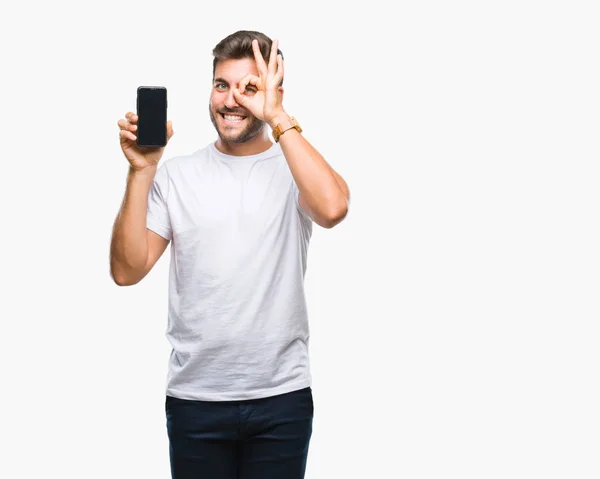 Junger Gutaussehender Mann Zeigt Smartphone Bildschirm Über Isoliertem Hintergrund Mit — Stockfoto