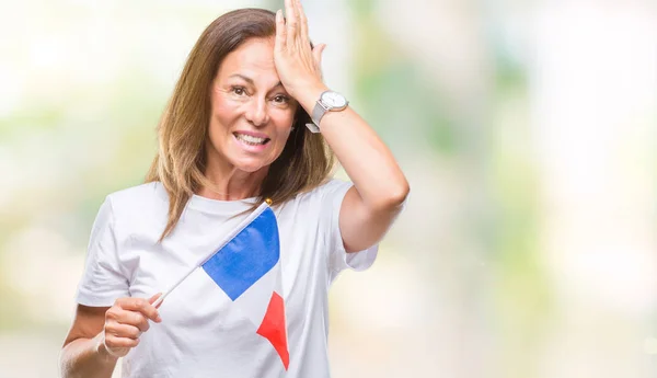 Латиноамериканка Средних Лет Держащая Флаг Франции Изолированном Фоне Напряженная Рукой — стоковое фото