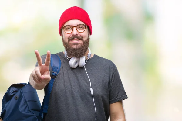 Young Hipster Man Wearing Red Wool Cap Backpack Isolated Background — Stock Photo, Image