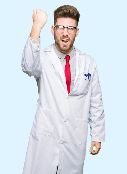 Young Handsome Scientist Man Wearing Glasses Angry Mad Raising Fist — Stock Photo, Image