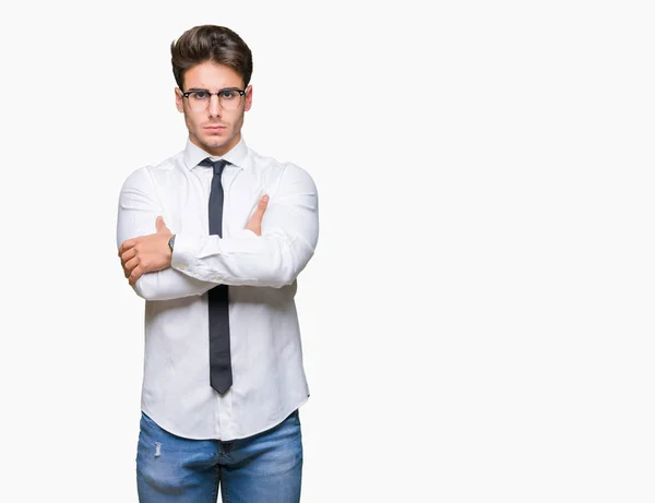 年轻的商人戴眼镜对孤立的背景怀疑和紧张 不赞成表情的脸交叉的武器 消极的人 — 图库照片