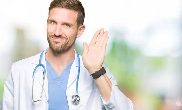 Handsome Doctor Man Wearing Medical Uniform Isolated Background Waiving Saying — Stock Photo, Image