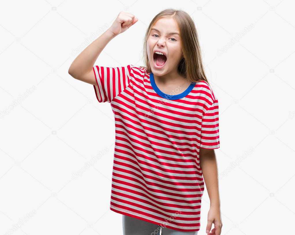 Young beautiful girl over isolated background angry and mad raising fist frustrated and furious while shouting with anger. Rage and aggressive concept.