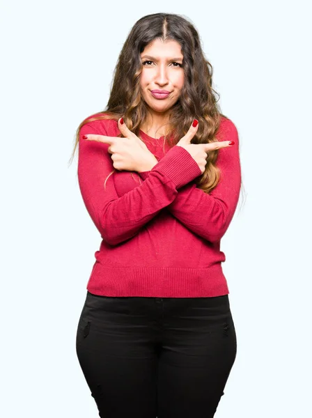 Mooie Jongedame Dragen Rode Trui Naar Beide Zijden Met Vingers — Stockfoto