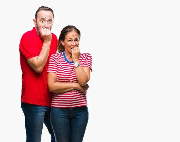 Middle Age Hispanic Couple Love Isolated Background Looking Stressed Nervous — Stock Photo, Image