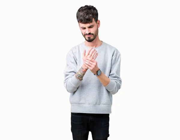 Jonge Knappe Man Dragen Sweatshirt Geïsoleerde Achtergrond Lijden Pijn Handen — Stockfoto