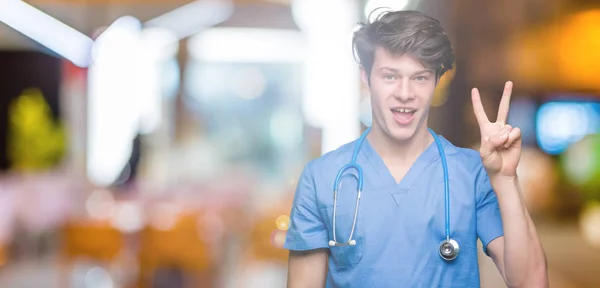 Mladý Lékař Lékařské Uniformě Nad Izolované Zobrazeným Pozadím Směřující Nahoru — Stock fotografie