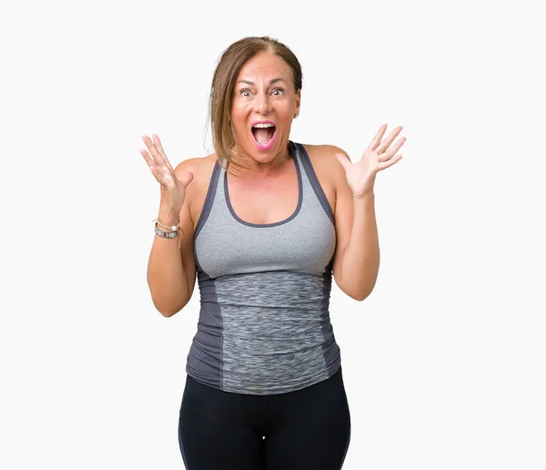 Mooie Middelbare Leeftijd Vrouw Sport Kleding Dragen Geïsoleerd Achtergrond Vieren — Stockfoto