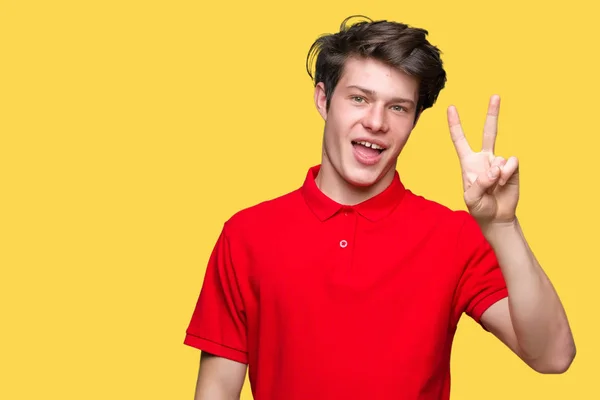 Jovem Homem Bonito Vestindo Camiseta Vermelha Sobre Fundo Isolado Mostrando — Fotografia de Stock