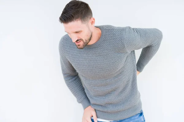 Jovem Bonito Homem Vestindo Camisola Casual Sobre Fundo Isolado Sofrendo — Fotografia de Stock