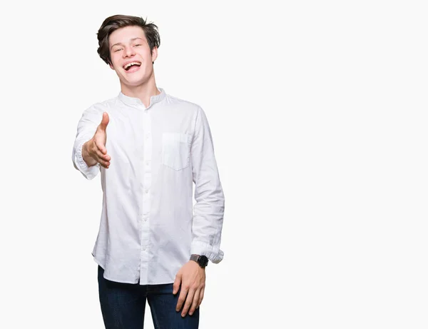 Młody Przystojny Biznesmen Białym Tle Uśmiechnięty Oferuje Przyjazny Uścisk Dłoni — Zdjęcie stockowe
