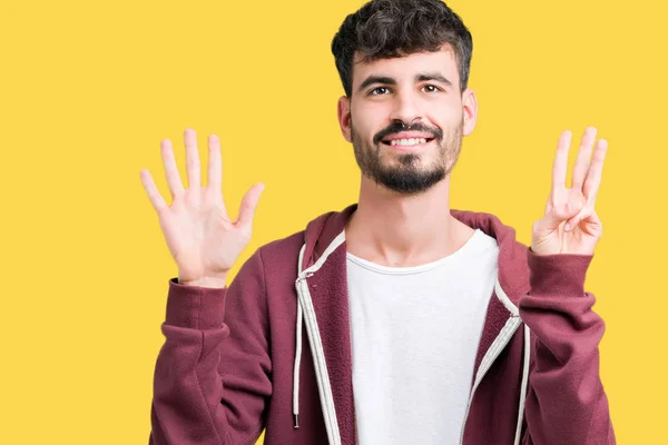 Joven Hombre Guapo Sobre Fondo Aislado Mostrando Señalando Hacia Arriba —  Fotos de Stock