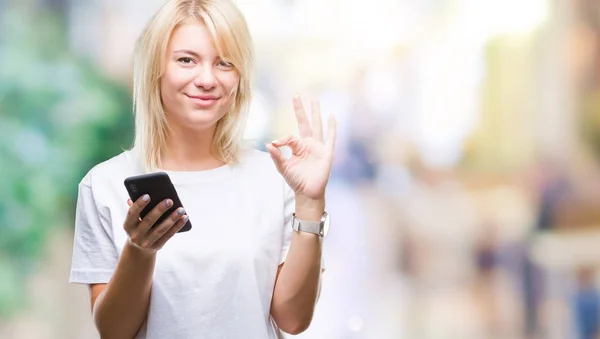 Jonge Mooie Blonde Vrouw Met Smartphone Geïsoleerde Achtergrond Doen Teken — Stockfoto