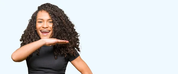 Young Beautiful Woman Curly Hair Gesturing Hands Showing Big Large — Stock Photo, Image
