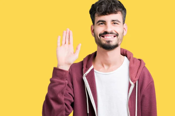 Jonge Knappe Man Geïsoleerde Achtergrond Afzien Zeggen Hallo Gelukkig Lachende — Stockfoto