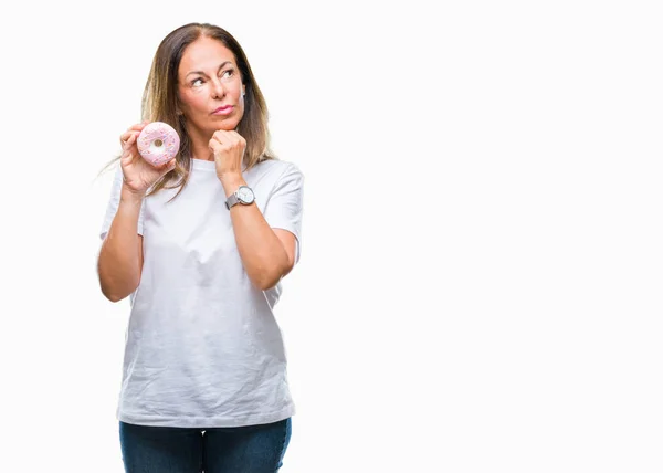 Mujer Hispana Mediana Edad Comiendo Rosquilla Sobre Fondo Aislado Cara —  Fotos de Stock