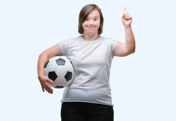 Junge Erwachsene Frau Mit Syndrom Hält Fußballball Über Isolierten Hintergrund — Stockfoto