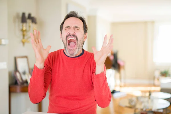 Handsome Middle Age Man Home Celebrating Mad Crazy Success Arms — Stock Photo, Image