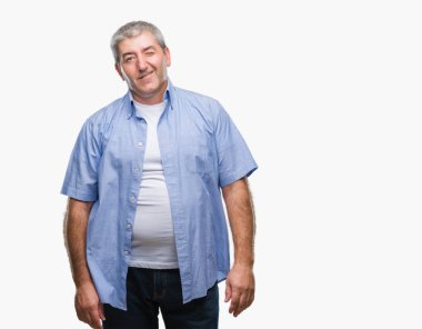 Seksi bir ifadeyle, neşeli ve mutlu yüzünü kameraya bakarak göz kırpıyor izole arka plan üzerinde üst düzey yakışıklı.