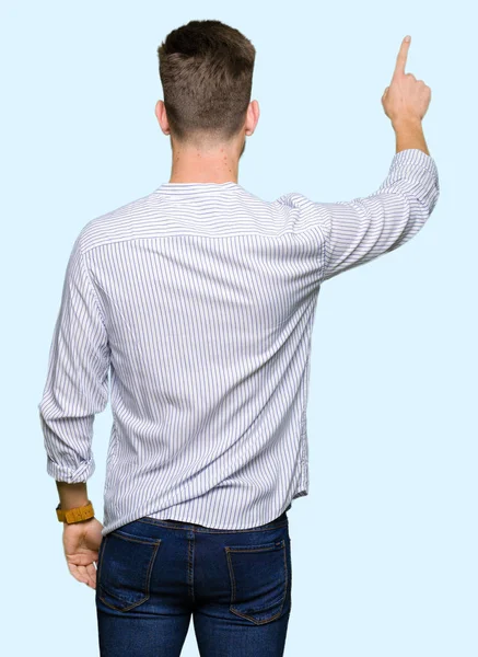 Young Handsome Man Posing Backwards Pointing Finger Hand — Stock Photo, Image
