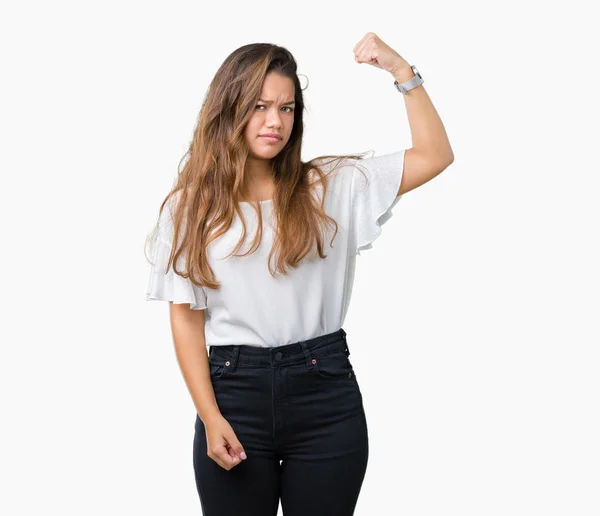 腕の筋肉 自信と力の誇りを示す孤立した背景強い人以上の若い美しいブルネット ビジネス女性 — ストック写真