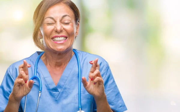 Enfermera Médica Mediana Edad Sobre Fondo Aislado Sonriendo Cruzando Los —  Fotos de Stock