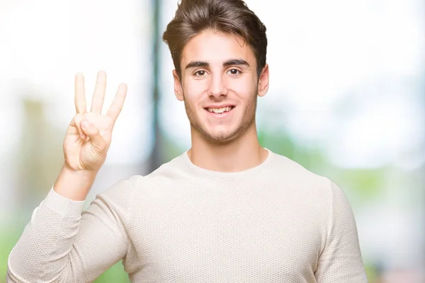 Joven Hombre Guapo Sobre Fondo Aislado Mostrando Señalando Hacia Arriba —  Fotos de Stock