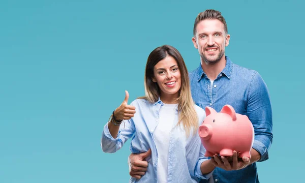 Young Couple Love Holding Piggy Bank Isolated Background Happy Big — Stock Photo, Image