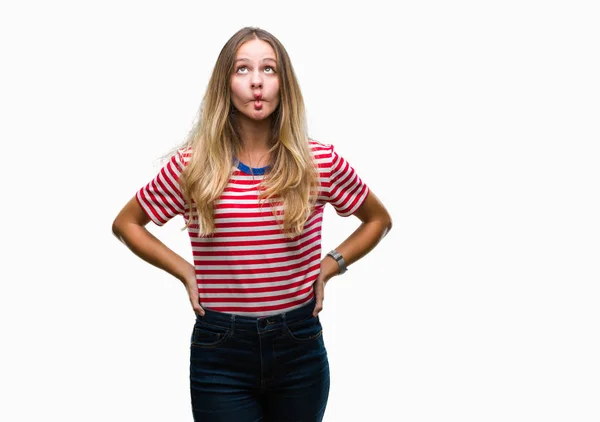 Giovane Bella Donna Bionda Sfondo Isolato Rendendo Faccia Pesce Con — Foto Stock