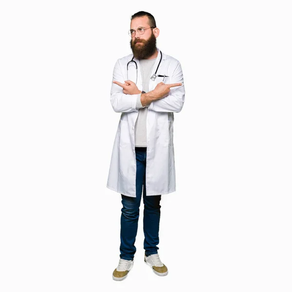 Young Blond Doctor Man Beard Wearing Medical Coat Pointing Both — Stock Photo, Image