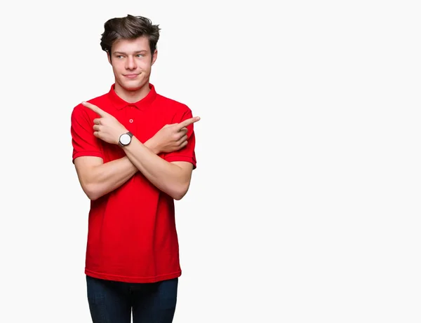 Młody Przystojny Mężczyzna Noszenie Czerwony Shirt Białym Tle Tło Pointing — Zdjęcie stockowe
