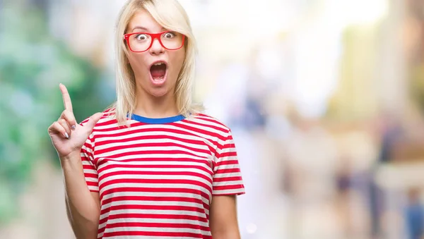 Young Beautiful Blonde Woman Wearing Glasses Isolated Background Pointing Finger — Stock Photo, Image