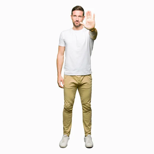 Knappe Man Dragen Casual Wit Shirt Met Palm Van Hand — Stockfoto